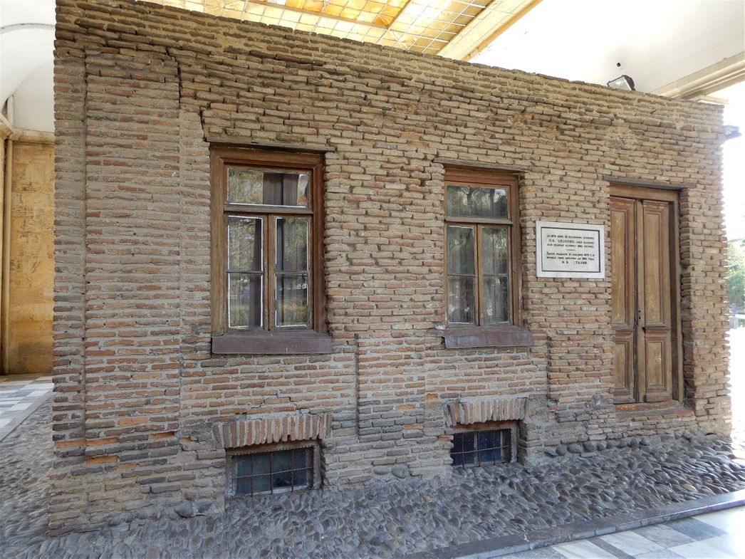 The house originally formed part of a line of similar dwellings, but the others have been demolished.  Here's the side entrance to the house.