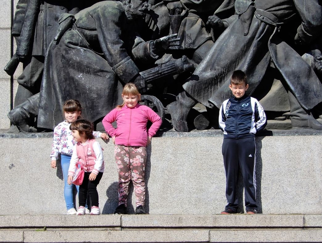 Children posing for me in front of one of  the Red Army Monument components.