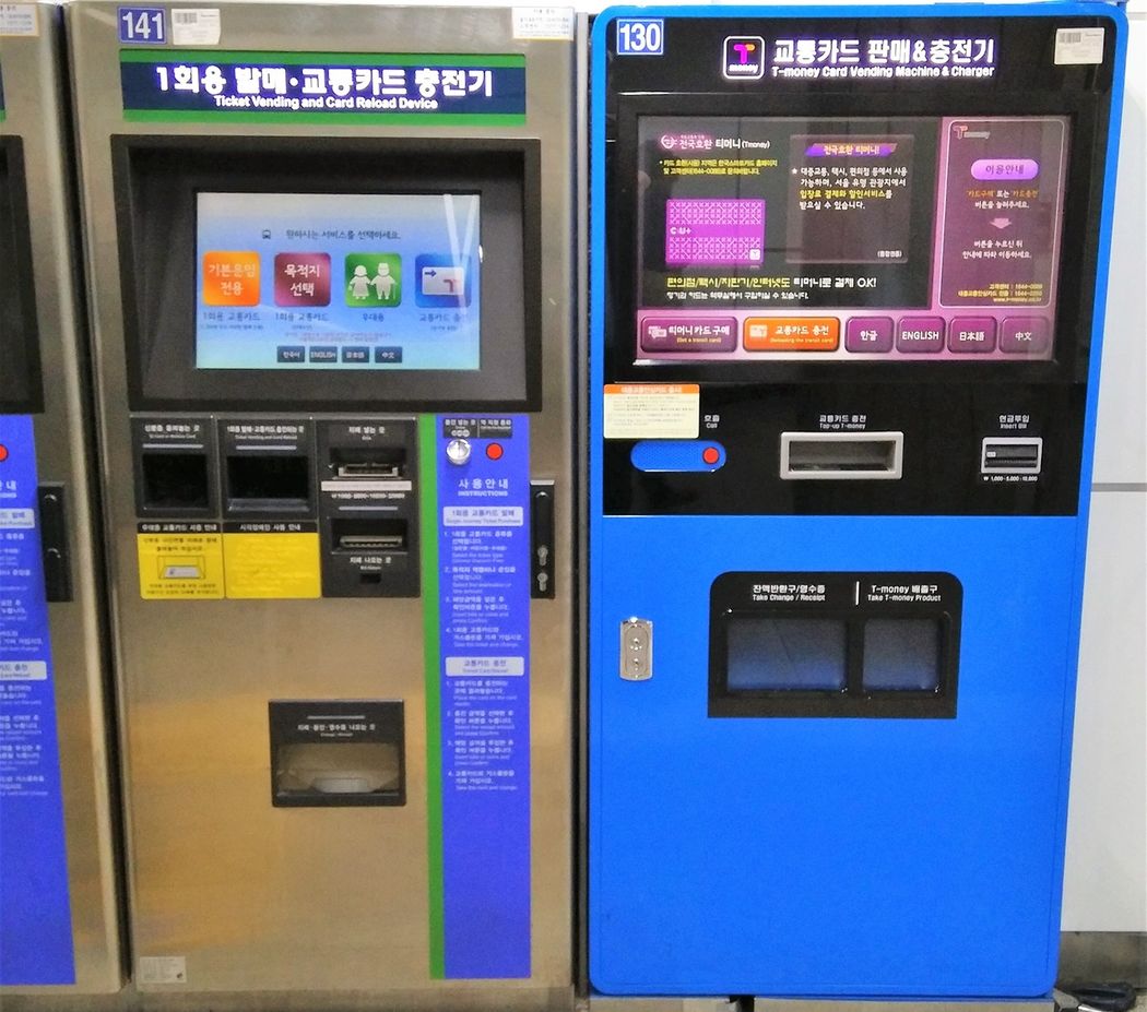 Ticket vending and Card reload Device (left) and T-Card vending machine and charger (right).