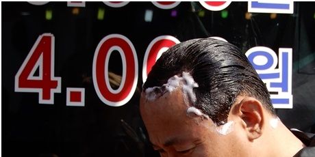 Most men dye their hair.  After they put the coloring product on their hair, they sit in the sun for better results.