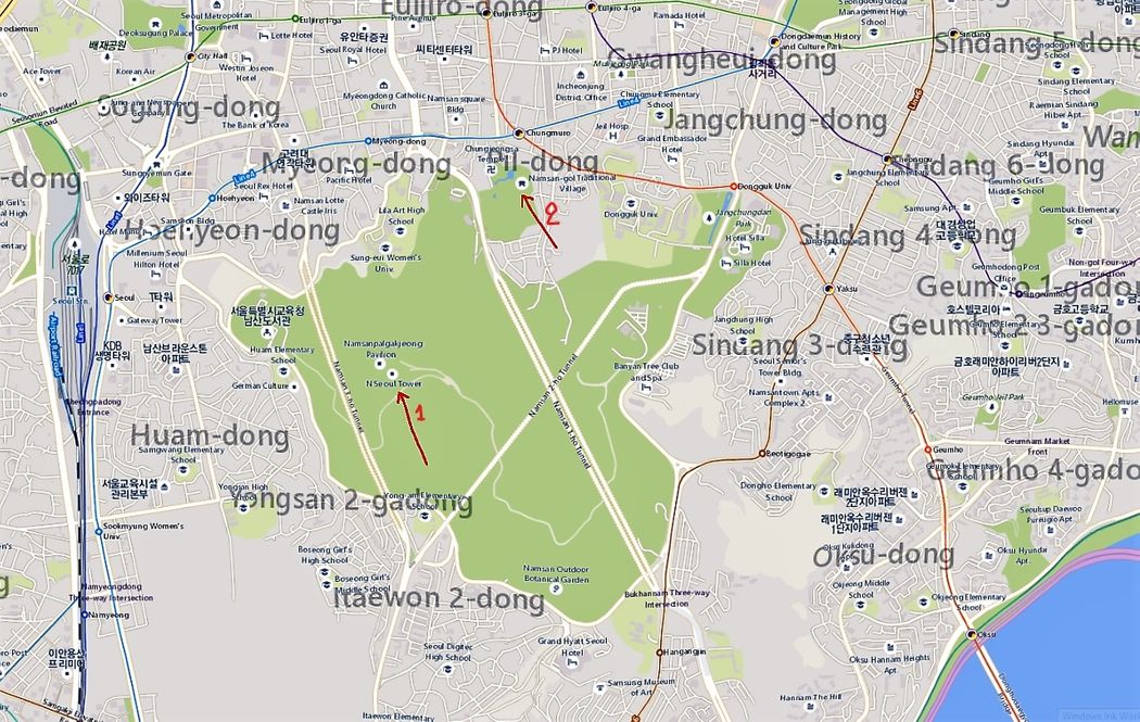 Namsan Park.  1=Seoul Tower, 2=Namsangol Hanok Village.