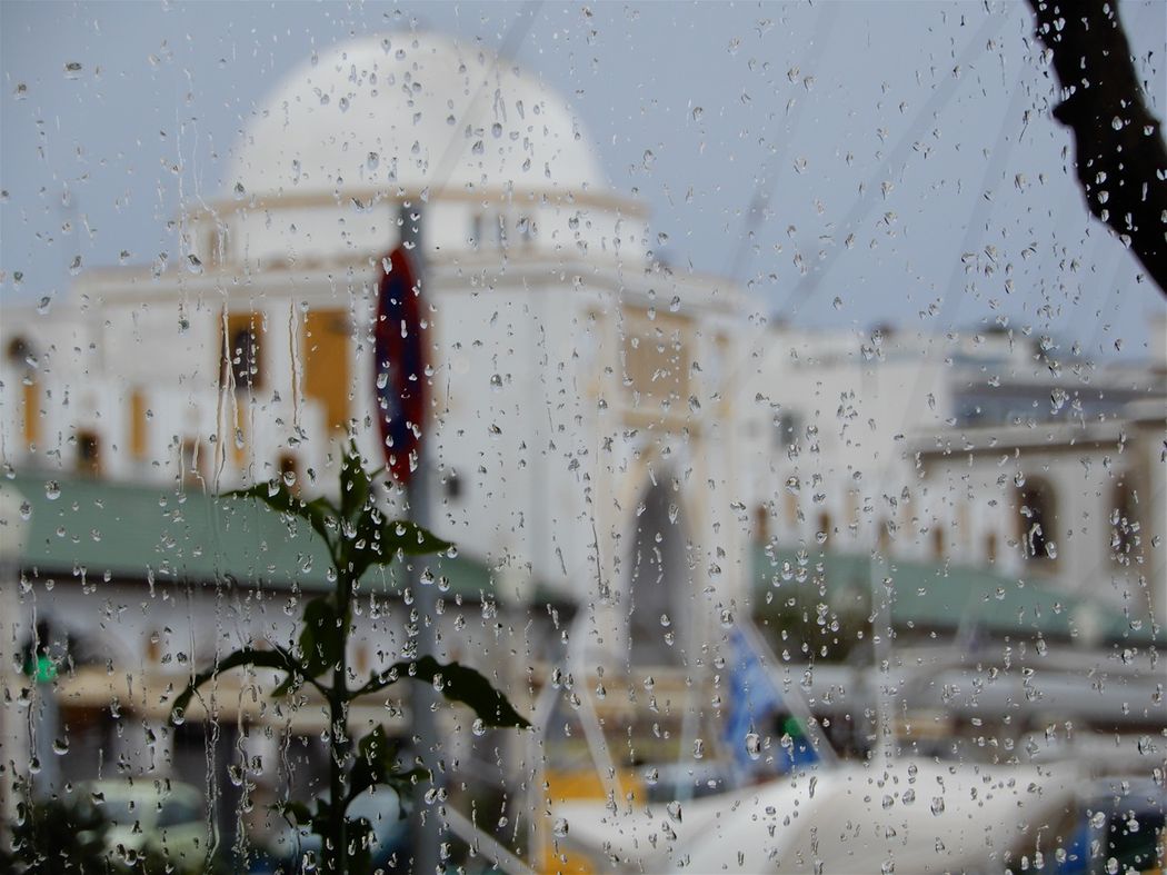 The New Market main Entrance seen from the Yachting club Cafe in a rainy day.