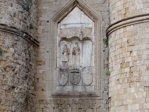 Virgin holding the Holy Infant, St. John the Baptist and St. Peter on the front side of the Marine Gate.