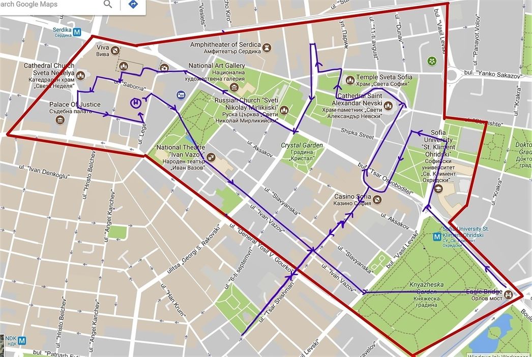 Map of the East part of central Sofia (red line boundaries) and proposed walk (blue line and arrows).  The encircled “H” shows the location of the Hotel (the start/finish of the walk).