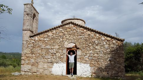 Me standing at the entrance of the little church.