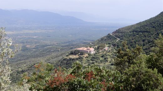 The new Voulkano Monastery seen from the road coming from Mavromati.