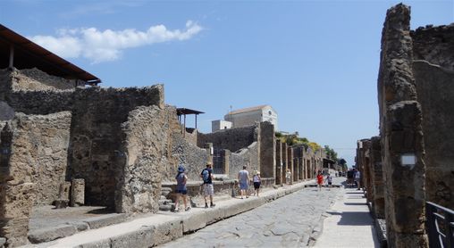 On the left can be seen a small hill, from where one can have nice views of the archeological site.