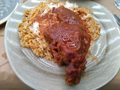 Beef cooked into tomato sauce and served with pasta.
