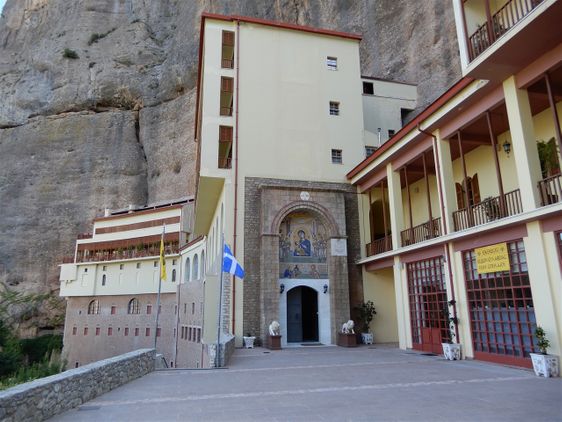 The courtyard of the Mega Spileo Monastery.  On the right is the suvenir shop and in the middle is the entrance to the main buiding and the katholikon.
