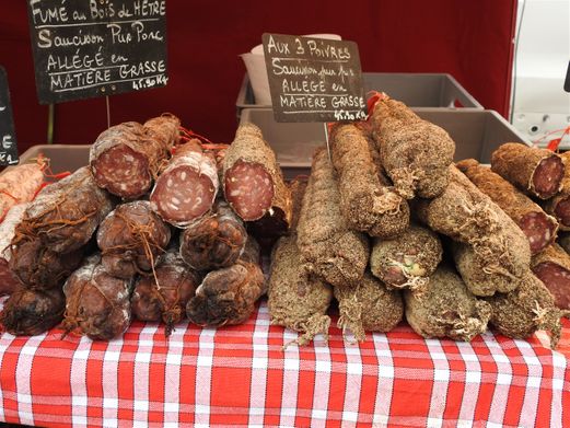 Saucisson displayed at an open market in Lyon.