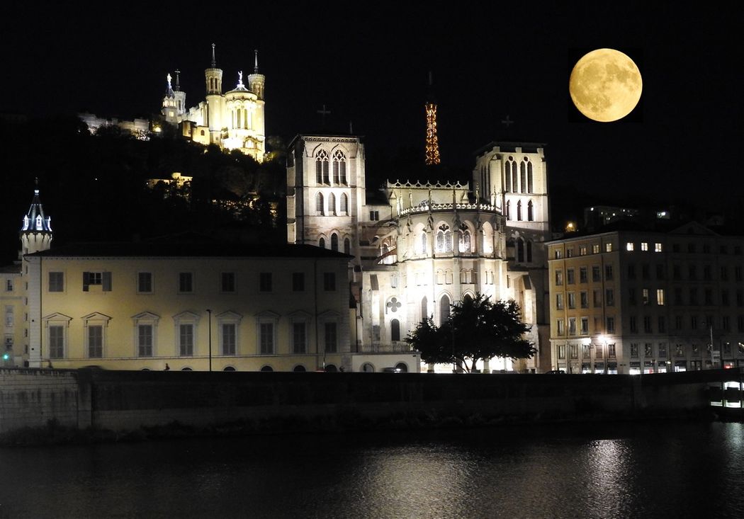 Fullmoon in Vieux Lyon. Notre-Dame de Fourvière seen at the top of the hill.