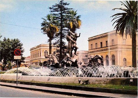 An old post card of Fontana di Proserpina.  The central Railway station is seen in the background.
