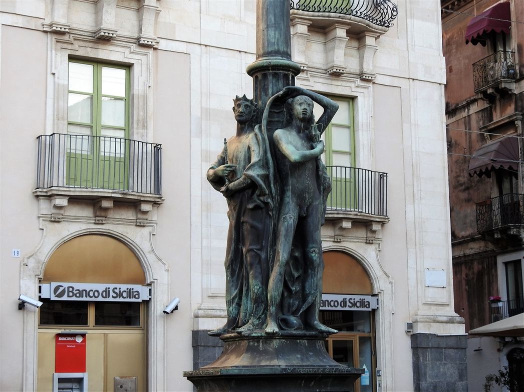 One of the four bronze artistic candlesticks at Piazza Università, representing the legend of Colapesce.