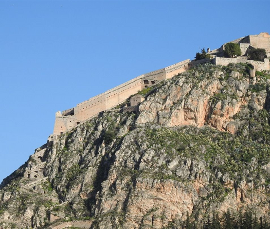 Palamidi fortress on top of a rock overlooking the old town of Nafplion.