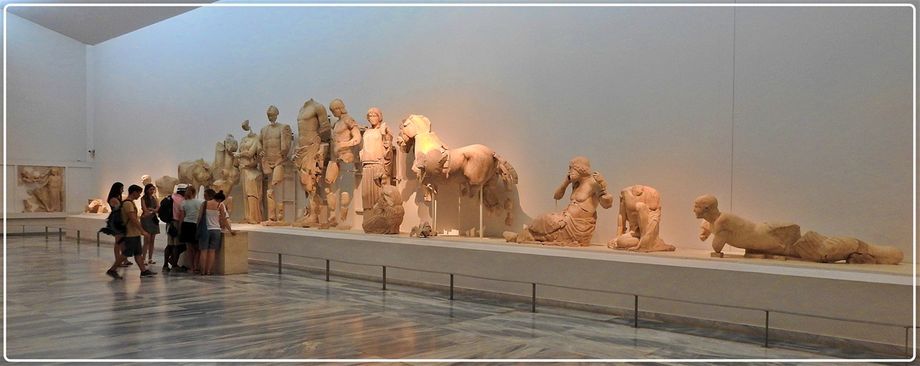 East Pediment of the Temple of Zeus, depicting the Pelopas and Oenomaos chariot race. Zeus appears as the central figure.