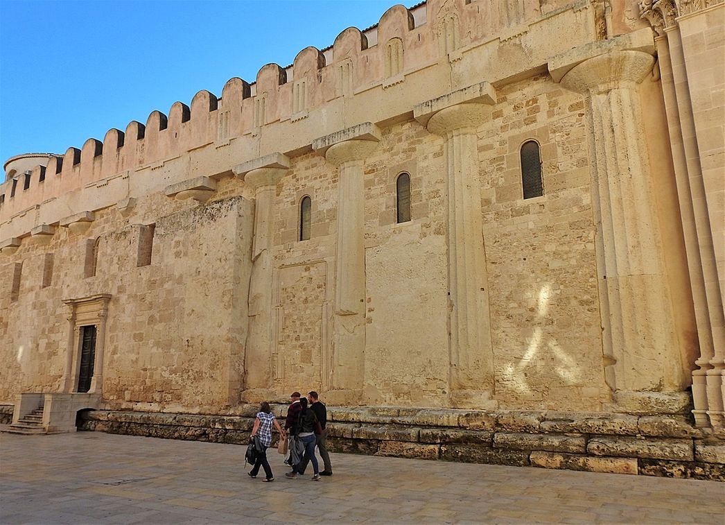 The battered Doric columns of the temple of Athena were incorporated in the walls of the current church. THis can be seen clearly both inside and outside the church.