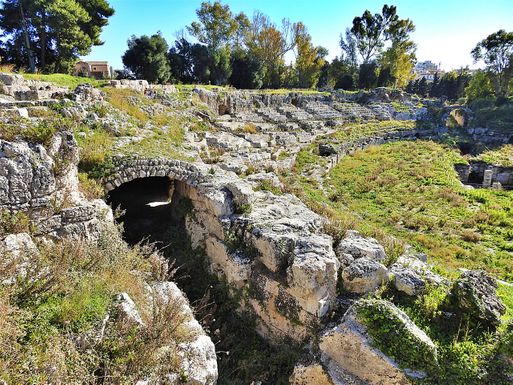 The Roman amphitheater. The vaulted corridor under the cavea, through which gladiators entered the arena.