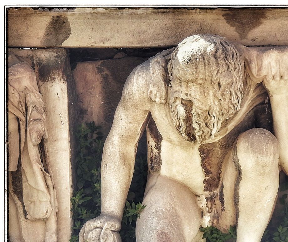 Theatre of Dionysus Eleuthereus. Statue of a kneeling satyr from the Roman stage building.