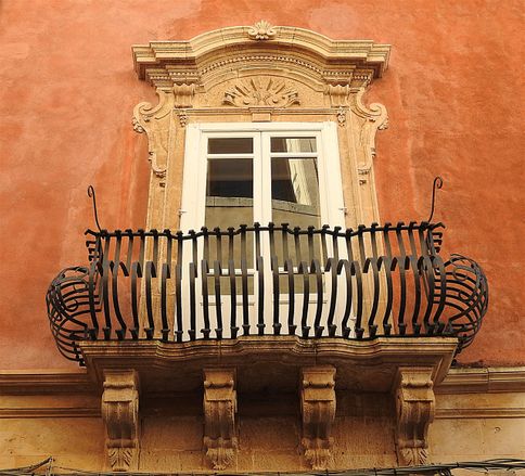 Typical Sicilian baroque window.