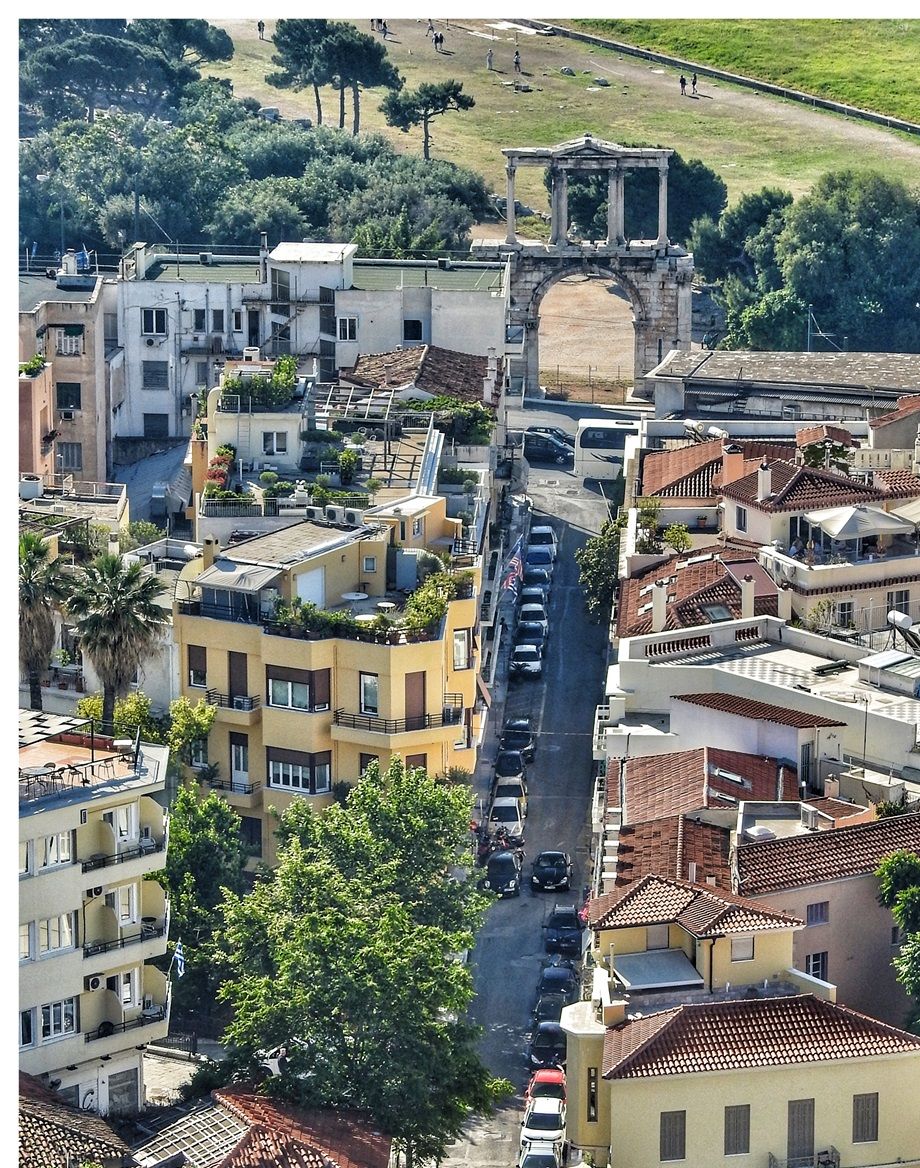 (East of the sacred rock) Lisikratous street and Hadrian's Arch.