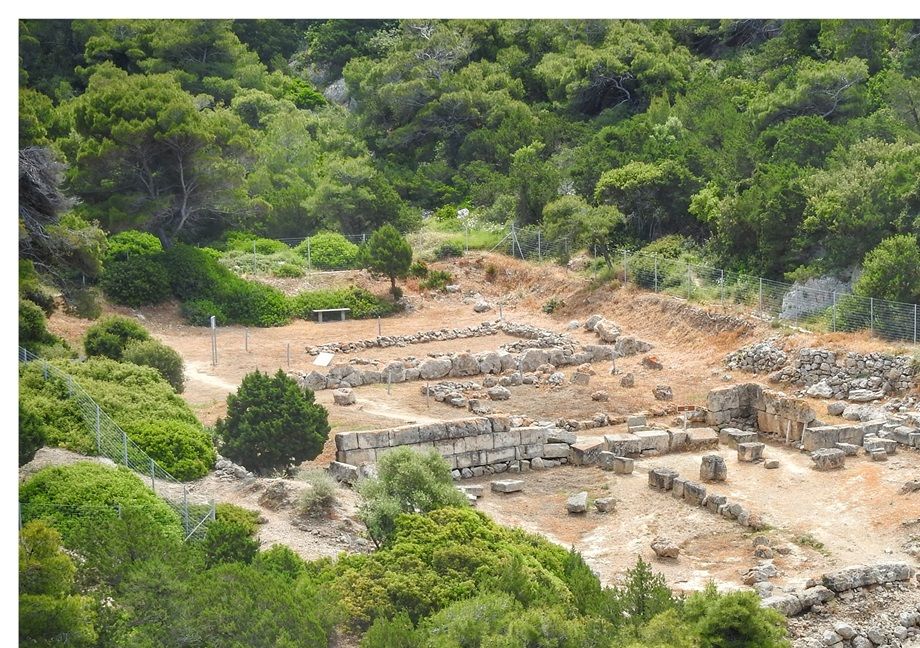 Temple of Hera Limanaia (at the background) and part of the walls (in the foreground).