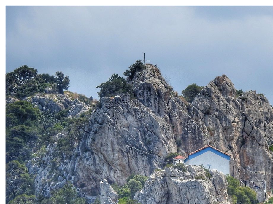 At the rocky hill, overlooking the archeological site from the east, stands the chapel of Agios Nikolaos.