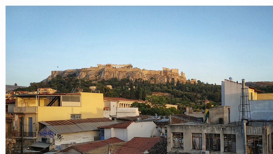 The south Acropolis slope seen from Cafe Avissinia (Avissinia Square, Monastiraki).