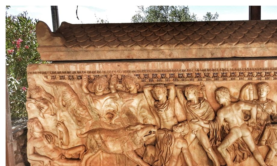 Marble sarcophagus with a relief about the hunt of the Calydonian boar on its main face (2nd century AD), in the courtyard of the Archaeological Museum of Eleusis.