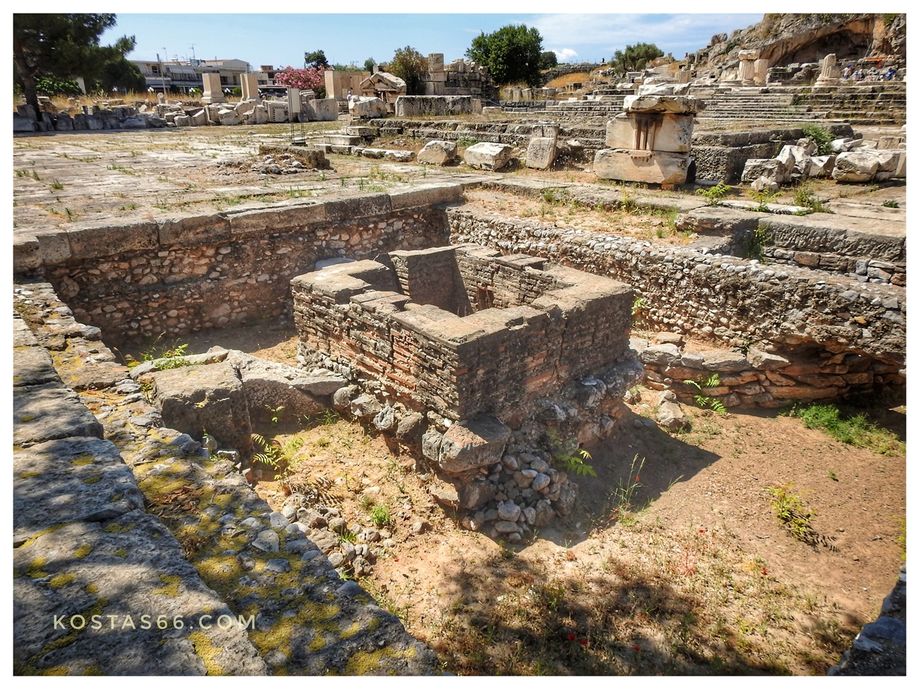 The Eschára where the sacrifices were made. Temple of Artemis Propylaea (at the background).