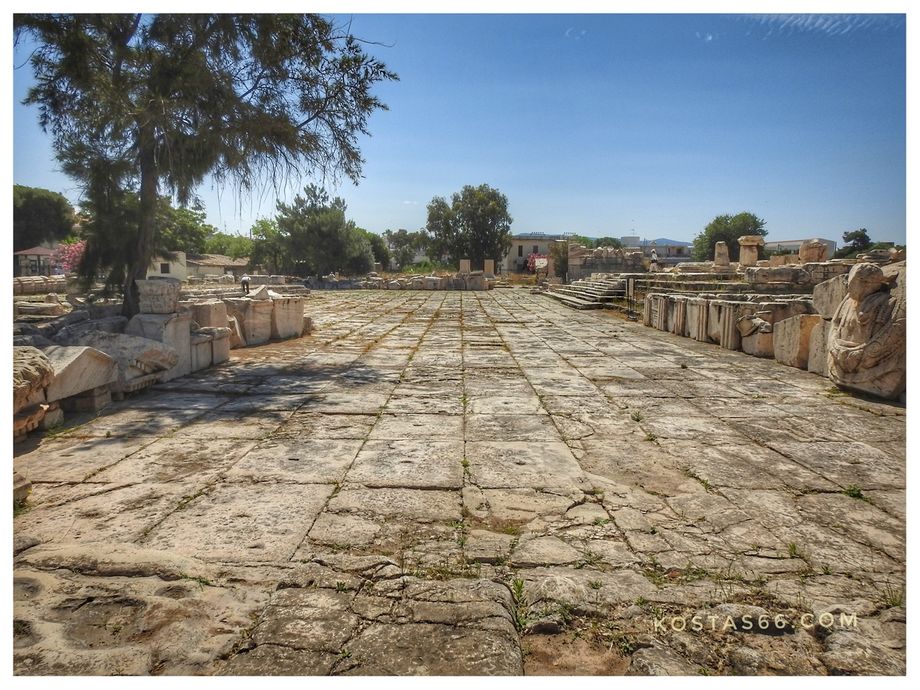 The Roman Court seen from the west towards the east.  On the left stand parts of the western Triumphal Arch and on the right the cuirassed bust of Marcus Aurelius.