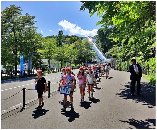 The Ōkurayama Ski Jump Stadium parking and the escalator at the background.