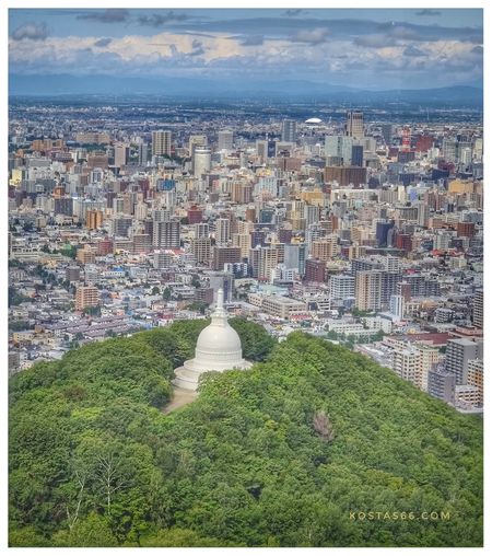 Sapporo Peace Pagoda seen from the summit observation deck of  Mount Moiwa.