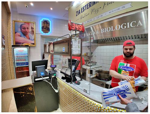 Inside ‘Antica Pizza Fritta da Zia Esterina Sorbillo’. Pizaiolos here have some extra kilos...obviously they also enjoy their products!