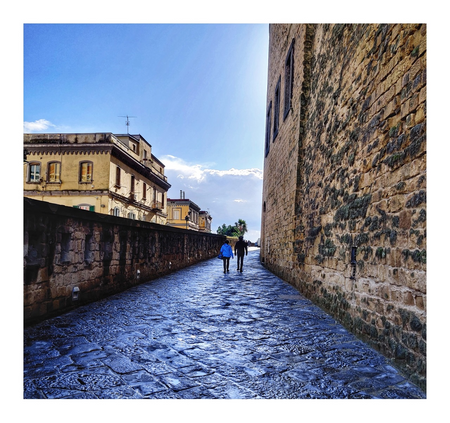 Inside the castle walls: the road that leads to the main building. Stairs take the visitor to the top of the castle (ramparts).  Τhere is also an elevator for those with mobility problems.