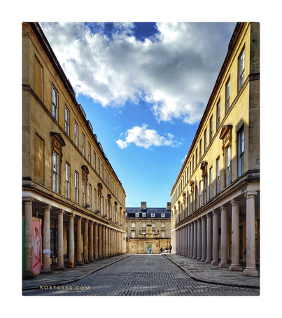 Bath street. With its impressive colonnades and cobbled street, Bath Street is incredibly picturesque. It was built by Georgian architect Thomas Baldwin in 1791, who also built The Cross Bath which you will find at the end of Bath Street.  The Cross Bath is an historic bathing pool, using the waters which bubbles up from the ground at a temperature of 46 °C.  Opposite the Cross Bath you will find the world-famous Thermae Bath Spa, Britain' s only natural thermal spa.  Unadorned by shop signs and capturing eighteenth century Bath perfectly, Bath Street lends itself well to filming, and has been used as a set for many films and television productions, including the 2006 adaptation of Jane Austen’s Persuasion.
