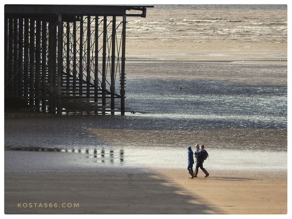 Under the Grand Pier at low tide.