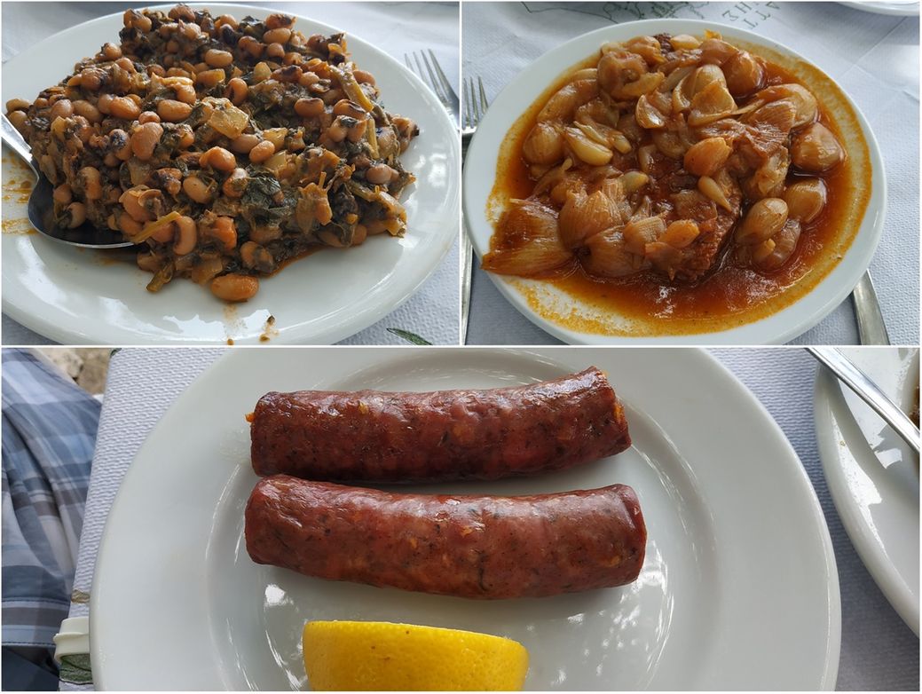 “Voulimeneas Café-Restaurant” dishes: beans with spinach, veal with onions in tomato sauce and maniot sausages (with spices and orange peel).