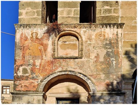 The external frescos of the Taxiarches (Archangels) at the bell-tower of the “The Presentation of the Virgin Mary” church.