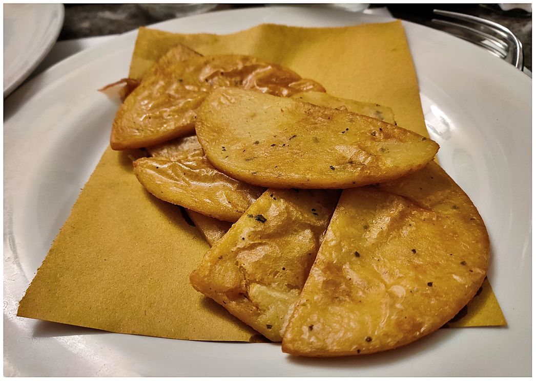 Freshly fried Panelle at 'Antica Focacceria San Francesco'.